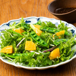 Beauty salad of seasonal vegetables and citrus fruits