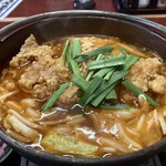 Aoi - 辛口うどん
                        中央には油淋鶏、その上にニラ