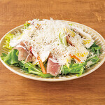 Caesar salad with Prosciutto ~ Finished with freshly shaved cheese on the table ~