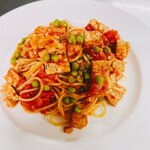 Tomato pasta with salsiccia and green peas