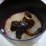山猫軒 - おかゆに肝と卵管と生姜の炊いたものがのります☆