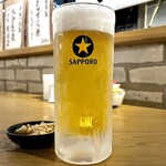 Motsuyaki Ban - ＊サッポロ生ビール（¥550）