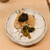 鮨 しゅん輔 - 料理写真:海苔の佃煮、葉わさびの醤油漬けを添えた平貝