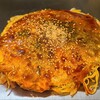 Okonomiyaki Kaede - 肉玉そば(税込770円)
                ・茹で生細麺(ひまわりフーズ)
                ・オタフクソース(フルーティーな甘口)
                ・焼き方:観察出来ず
                ・焼き上がりの形:やや乱れた焼き上がり
                ・鉄板又はお皿で食べるのがスタンダード 