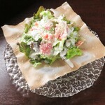 Caesar salad with spring roll wrappers