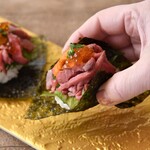 Hand-rolled kimbap with sea urchin and roast beef yukke