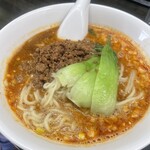 自家製麺 いづみ - 名物一番人気の担々麺（連れがオーダーしたのを写真だけパシャ）