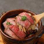 Japanese black beef and burdock rice in clay pot