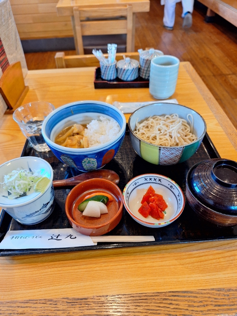 辻 九
