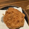 炭あうん - 240312火　福岡　酒場あうん 博多店　もつ鍋そのまんまクリーミーコロッケ328円