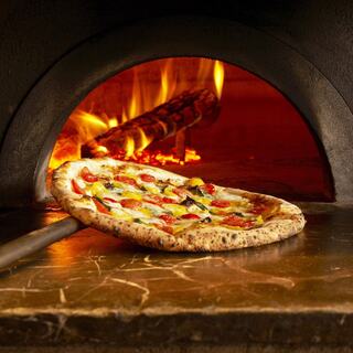 A "one-of-a-kind" pizza baked in a wood-fired oven with special attention to the dough.