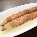 White asparagus and Prosciutto frit with cheese fondue sauce