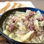 Whitebait, firefly squid and cabbage Ajillo served with baguette