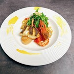 Spring sea bream, red shrimp, and scallop tagliatelle fresca in bianco sauce, with lemon-marinated spring onions and celeriac