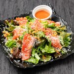 Thick-sliced Aurora salmon salad with onion and Saikyo miso dressing