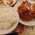 松楽菜館 - 料理写真:油淋鶏定食。搾菜や冷奴、中華スープにデザートの杏仁豆腐などまで付いて税込み935円也。