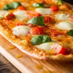 Margherita with fresh basil and tomatoes