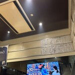 ぼてやん多奈加 - 店内には所狭しとサインやユニフォームが