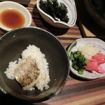 磯一 - ≪２０１４年２月≫アラカルトメニューから。天然ノド黒の土鍋炊きを取り分けました。お出汁でお茶漬けも出来ますよ。