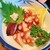 おかめ - 料理写真:この蛸ブツは凄い。半レアで、しかも柔らかい。薬味は生姜醤油か山葵醬油が選べます