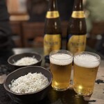 Kushi Wakamaru - お通し・プレモル瓶ビール