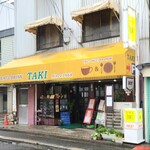 TAKI - 広島電鉄海岸通電停から徒歩3分の「TAKI」さん
            1968年開業、店主さんと男性スタッフ1人の2名体制
            朝7時から営業
            白い鋼板に覆われた建物で黄色い防水布の庇、年季を感じさせる佇まい