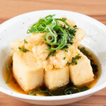 Deep-fried tofu with chicken tempura and seaweed