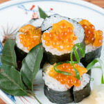 Sea urchin and salmon roe overflowing Sushi