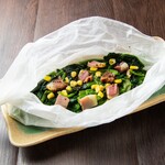 Steamed spinach and bacon wrap
