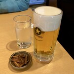 Mammaru - 生ビール600円とサービスの骨せんべい