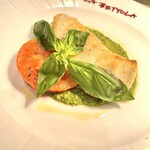 Grilled sea bass with basil sauce