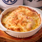 Potato and cod roe baked with cheese