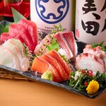 Assortment of five pieces of sashimi