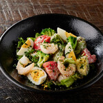 Shrimp and avocado Caesar salad