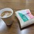 ニコニコ屋 - ドリンク写真:ニコニコ饅頭とコーヒー