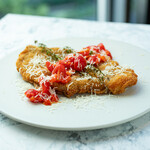 Schnitzel with paprika and fresh tomatoes