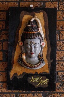 Kareresutoranshiba - 店内を見守るシバ神は以前のスタッフからのプレゼント　ネパールのパタンより