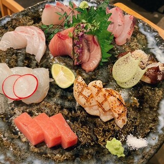 Be sure to try the platter of our signature sashimi!