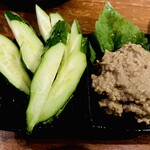 朱楽 - ついつい頼んでしまうかに味噌✨たっぷり入っていて大きめに切って下さってるきゅうりに付けながら…ポン酒が止まらない♪（≧∇≦）♪✨