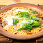 Egg simmered with Kujo leeks and Tochio age