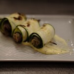 Rolled zucchini skewers with burnt butter