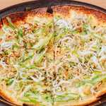 Whitebait and green onion pizza topped with roasted black shichimi spice