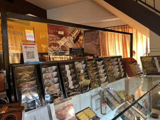 PATISSERIE MAISON de KITAGAWA CHOCOLATERIE - 人気の「熊本カカオ」は、オーガニックショコラ入りのバター生地に天草晩柑のコンフィを加えてしっとりとカカオ型に焼き上げています。