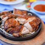 ไก่ย่าง (Thai street food stall grilled chicken thighs)