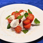 Caprese with "Amamade" cherry tomatoes and buffalo mozzarella cheese