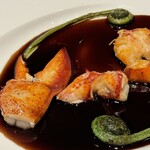 メロディア - Roasted lobster tail with sauteed fiddlehead & lavender flavored red wine sauce