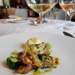 マダム・トキ - 太刀魚のムニエル富山県産ホタルイカと
      丹波篠山イノシシのベーコン.ソースブールノアゼット