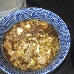 麺心 國もと - 特製つけ麺(中)のつけ汁のアップ