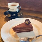 エクチュア - 【2023年12月】テオブロマケーキセット＠1,265円(込)、ドリンクはダークチョコレート（＋110円）。