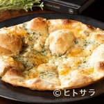 ESCAPE - 季節によって替わるチーズのハーモニー『クアトロフォルマッジ』